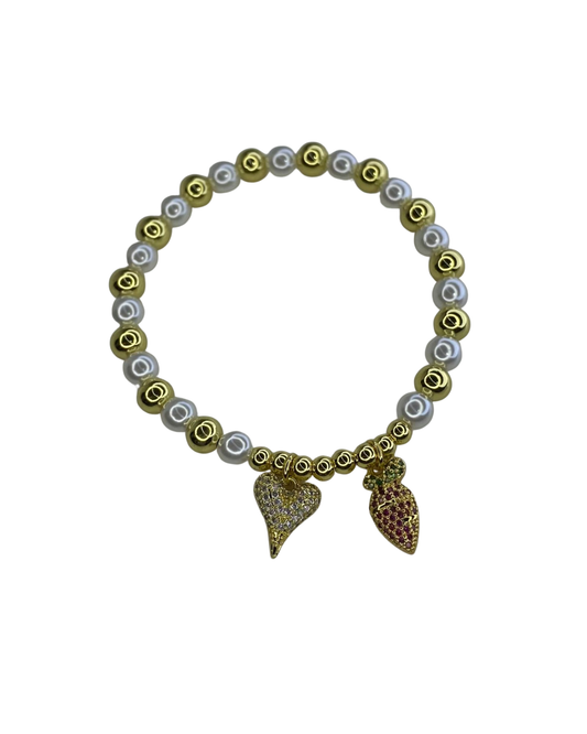PULSERA DORADA CON PERLAS Y DIJES